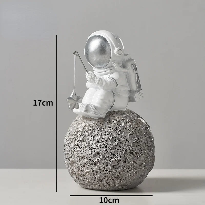 Statuette astronaute pêcheur