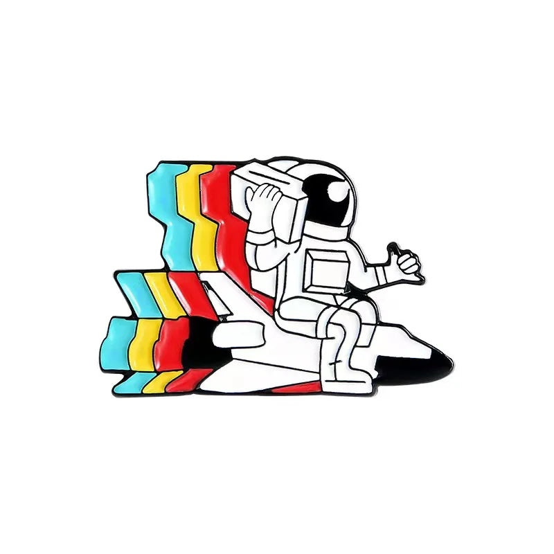 Pin's Astronaute chevauche Fusée
