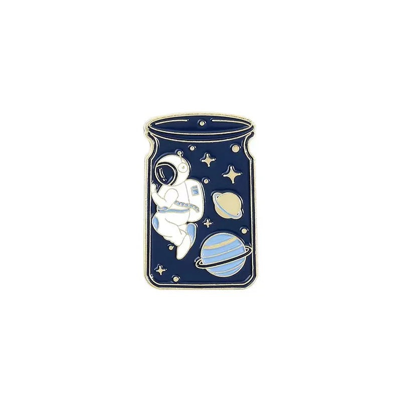 Pin's Cartoon Cosmonaute dans l'espace