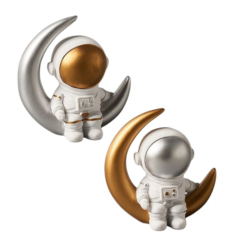 Cosmonaut figurine sitting on the moon