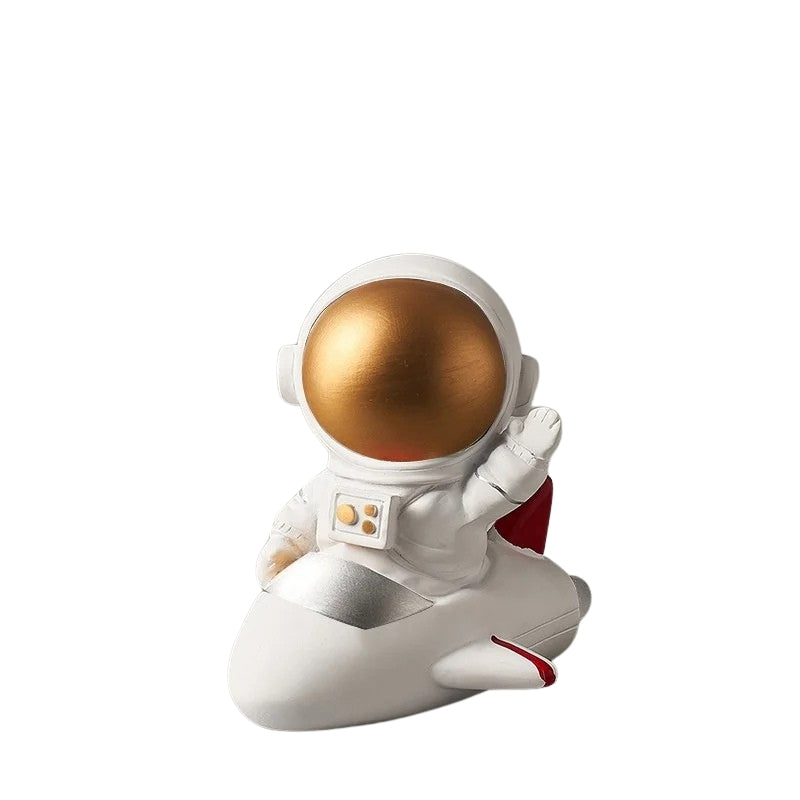 Astronautenbeeldje in zijn raket